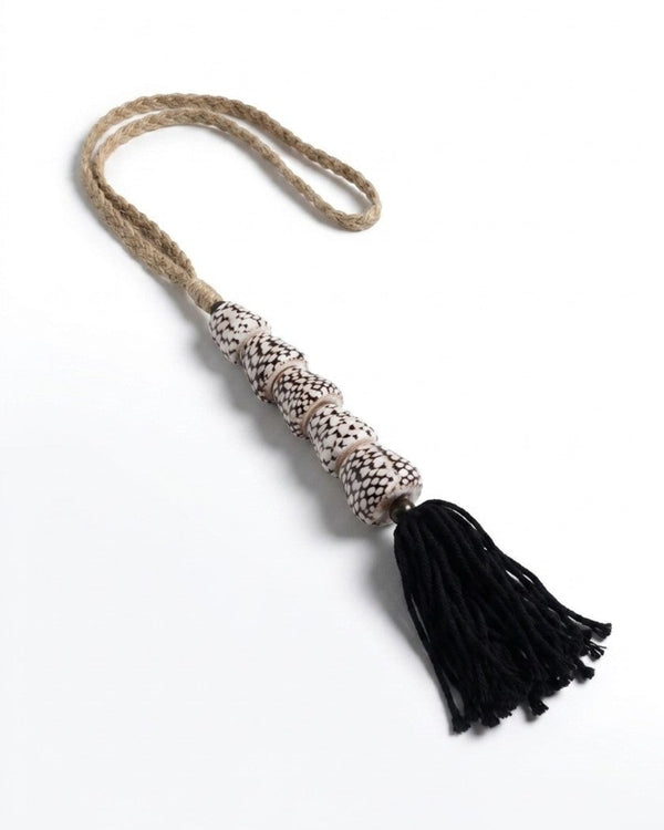 THE OBSIDIAN SHELL TIEBACK